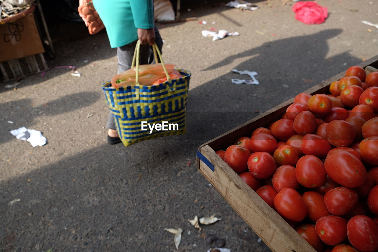 LOW ANGLE VIEW OF FRUITS FOR SALE IN MARKET