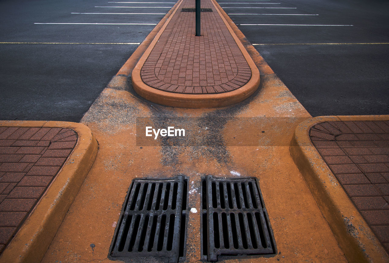 High angle view of manhole on road