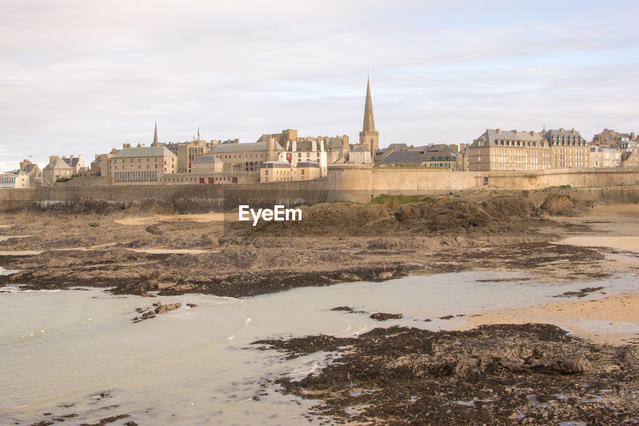 View of the walled city of saint-malo at low tide, france