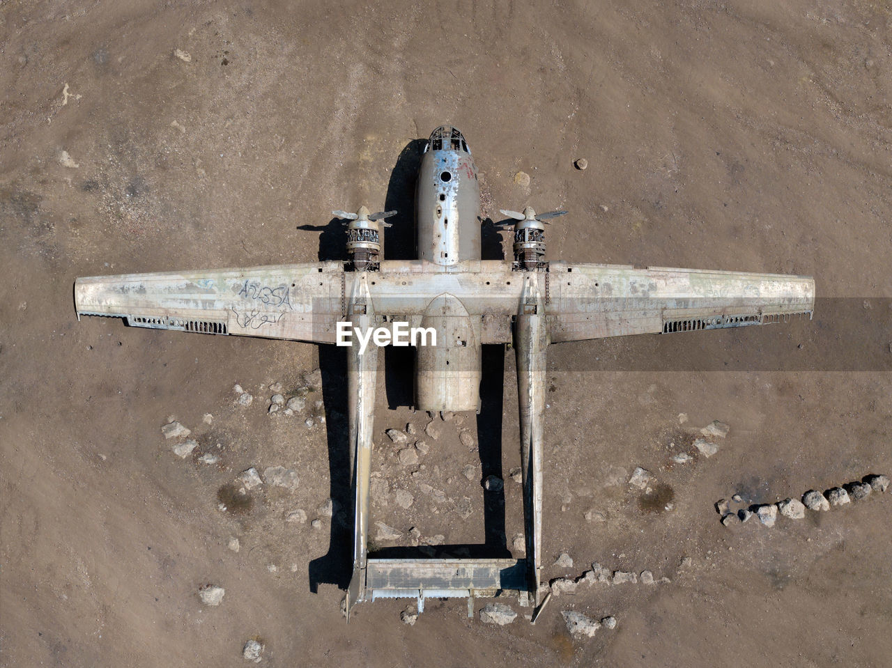 no people, aircraft, wing, iron, airplane, cross, religion, day, vehicle, high angle view, belief, spirituality, outdoors