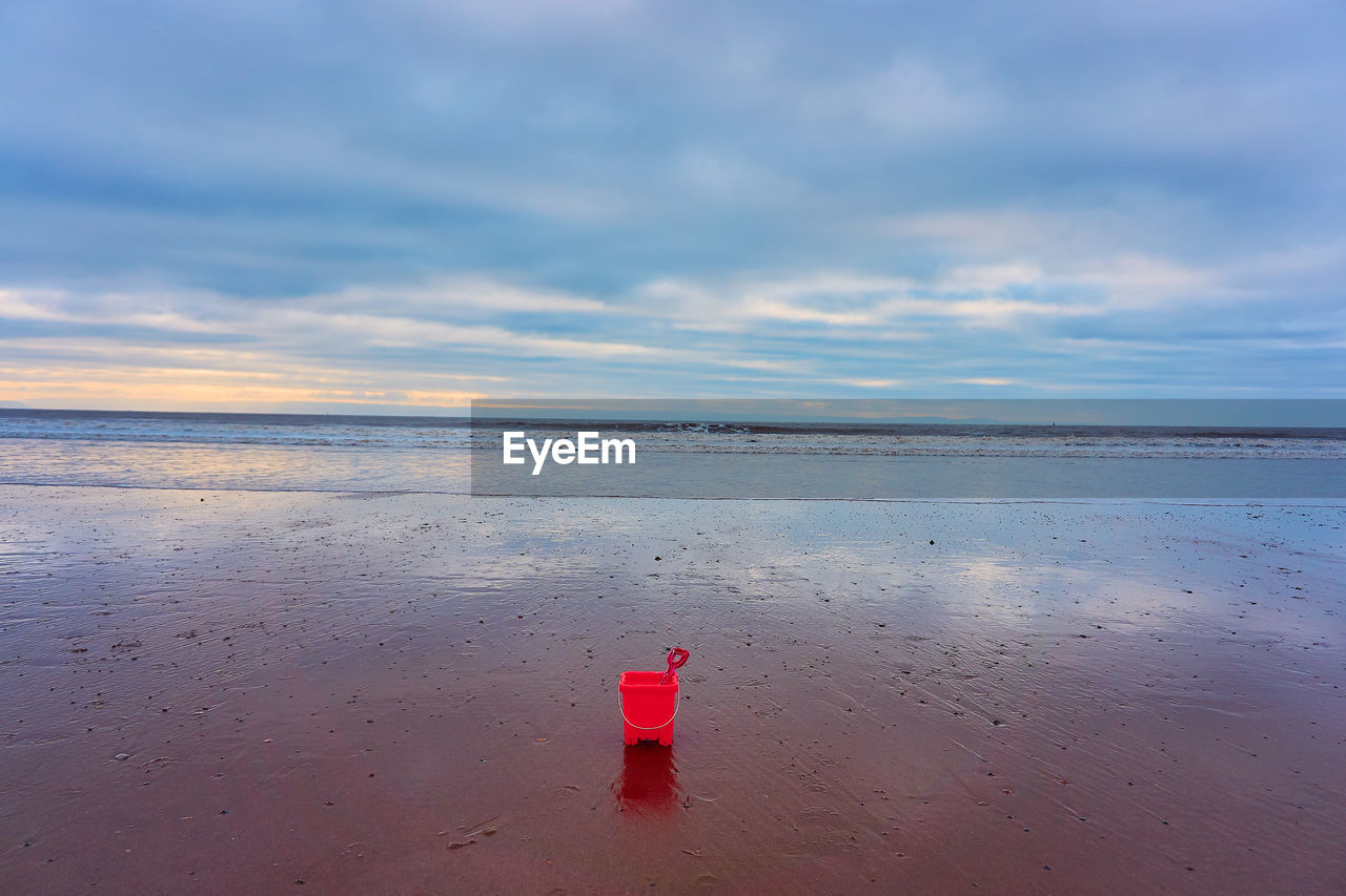 REAR VIEW OF BOY ON BEACH