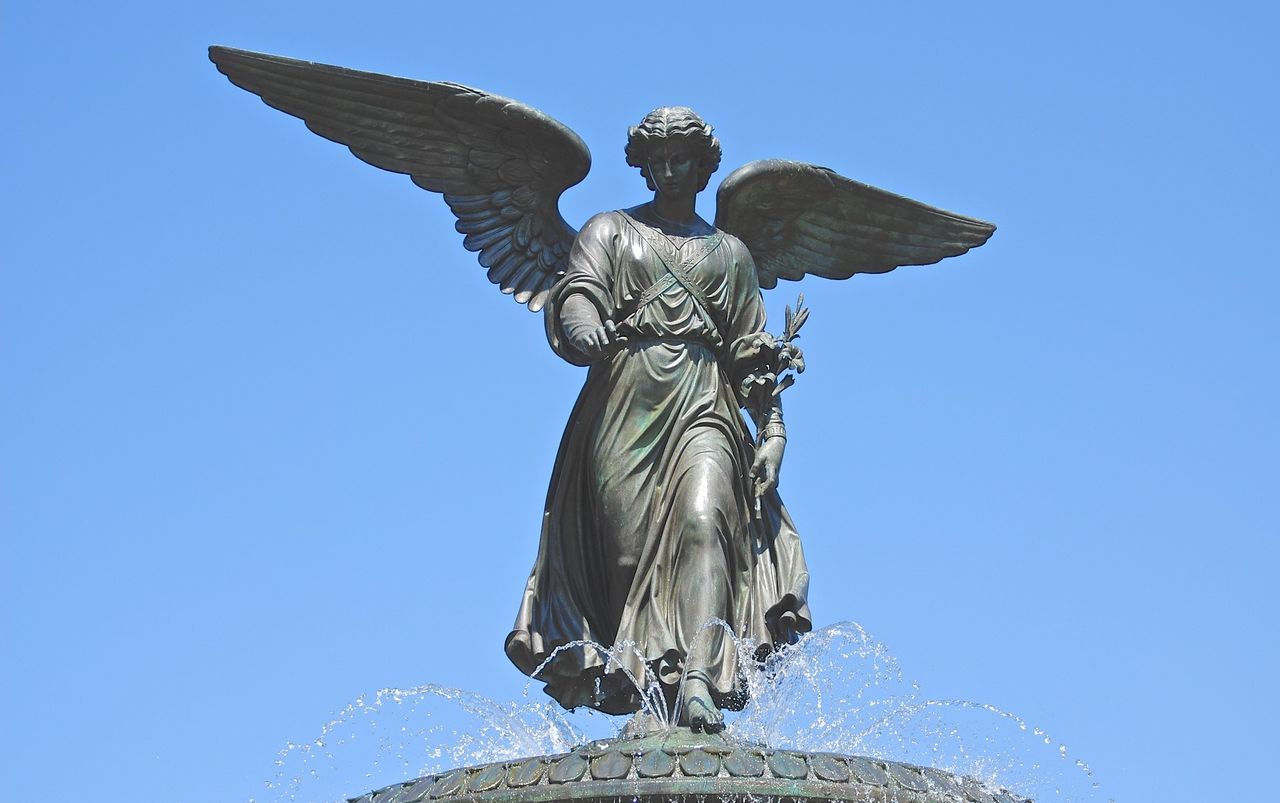 Low angle view of bethesda terrace and fountain against clear sky