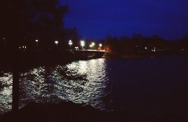 VIEW OF RIVER AT NIGHT