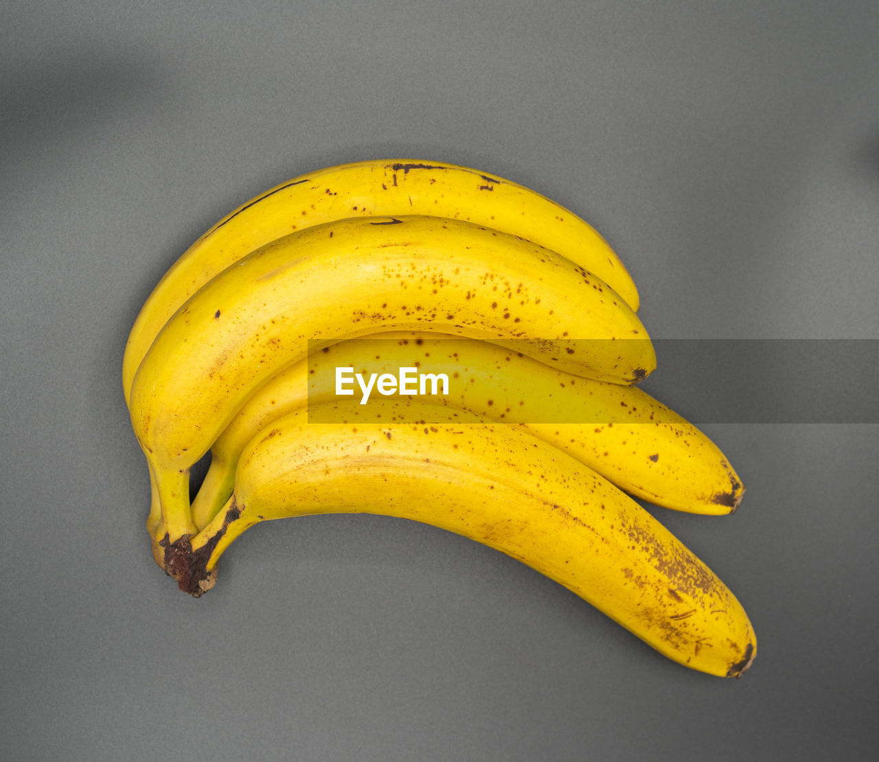 Some bananas from canary islans on a dark blackground