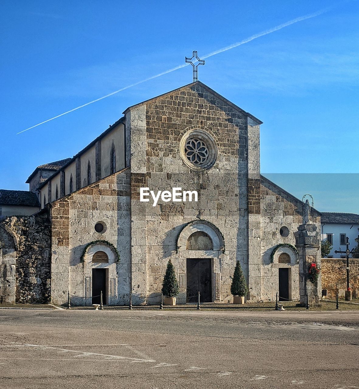 EXTERIOR OF TEMPLE AGAINST BUILDING