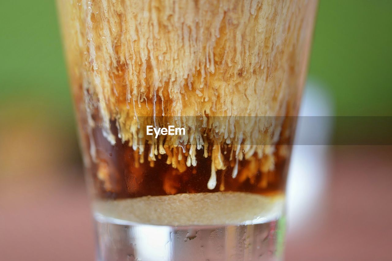 Cropped image of coffee in glass