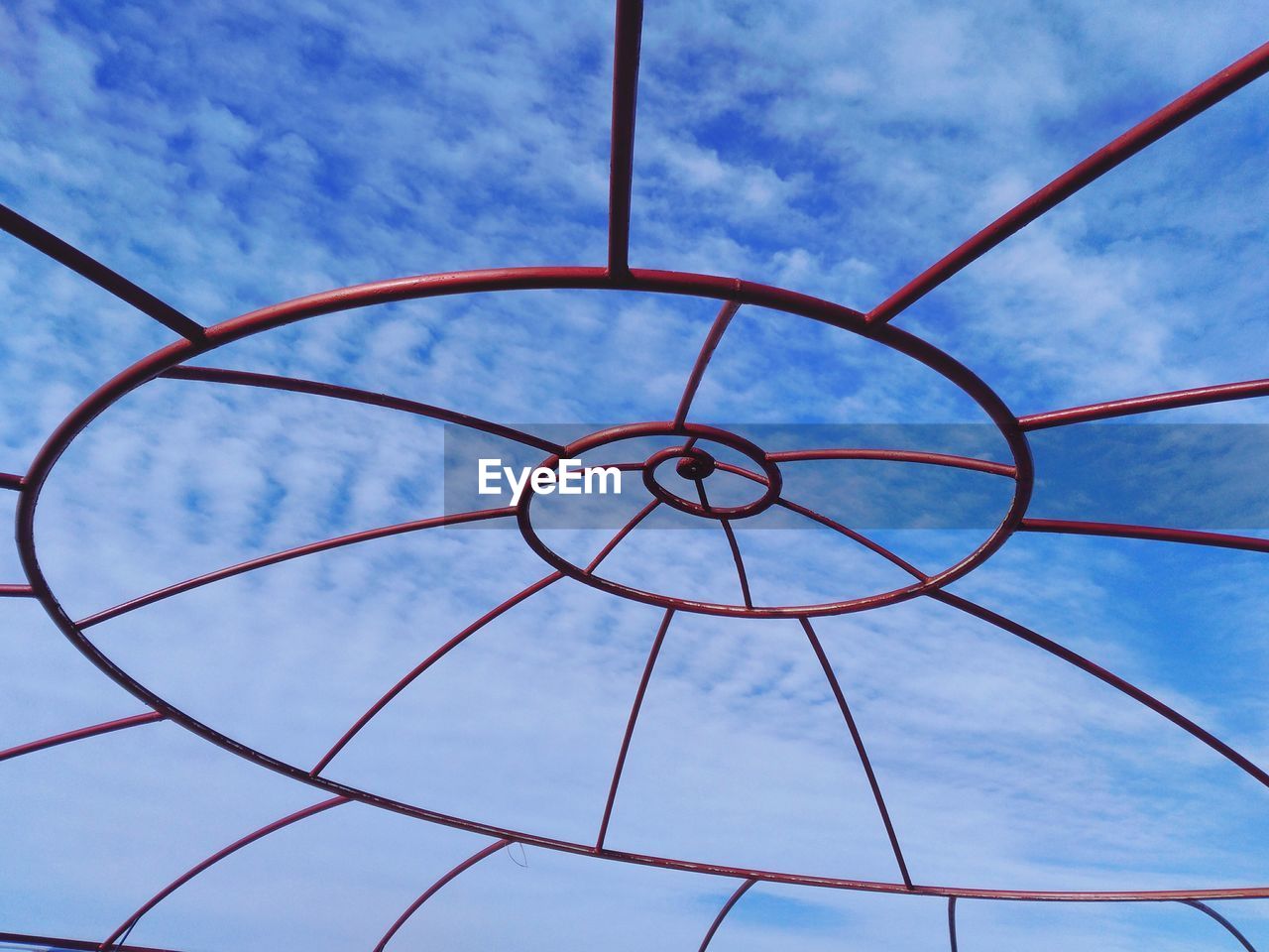 Low angle view of metallic structure against sky