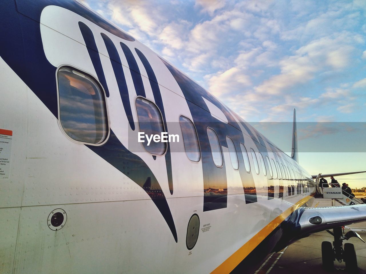 LOW ANGLE VIEW OF AIRPORT AGAINST SKY