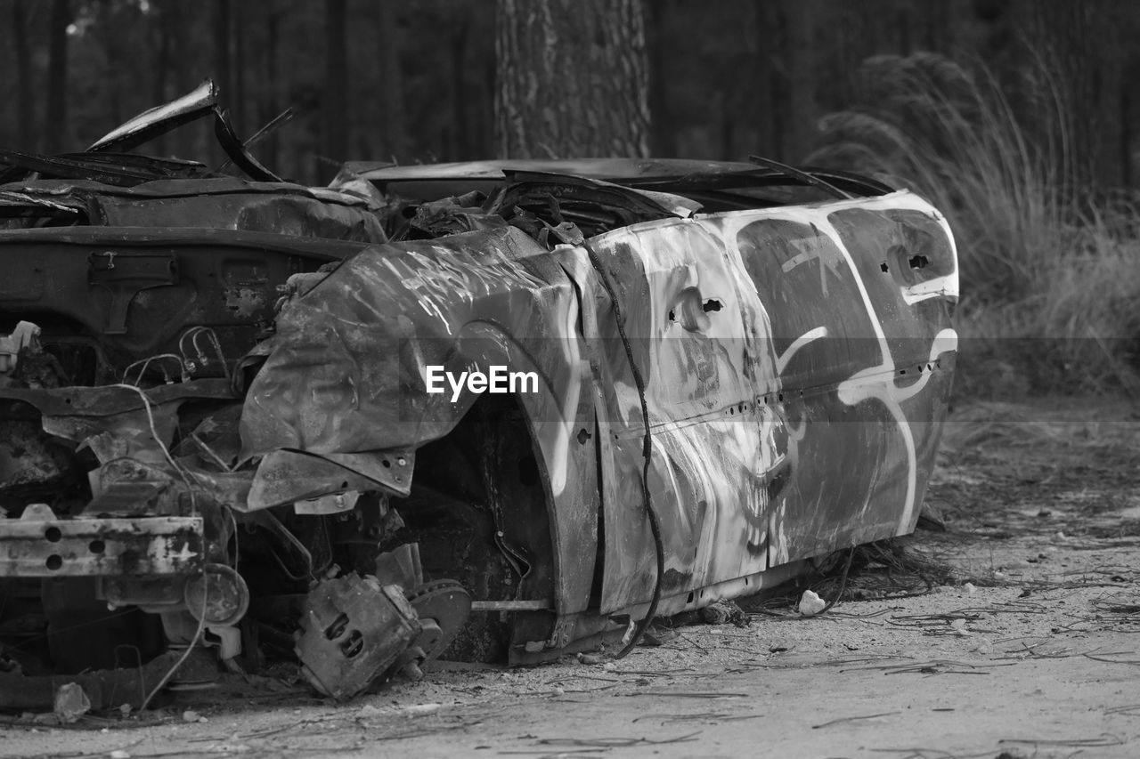 ABANDONED TRUCK ON FIELD