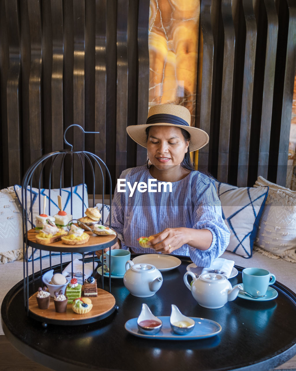 portrait of woman having breakfast at table