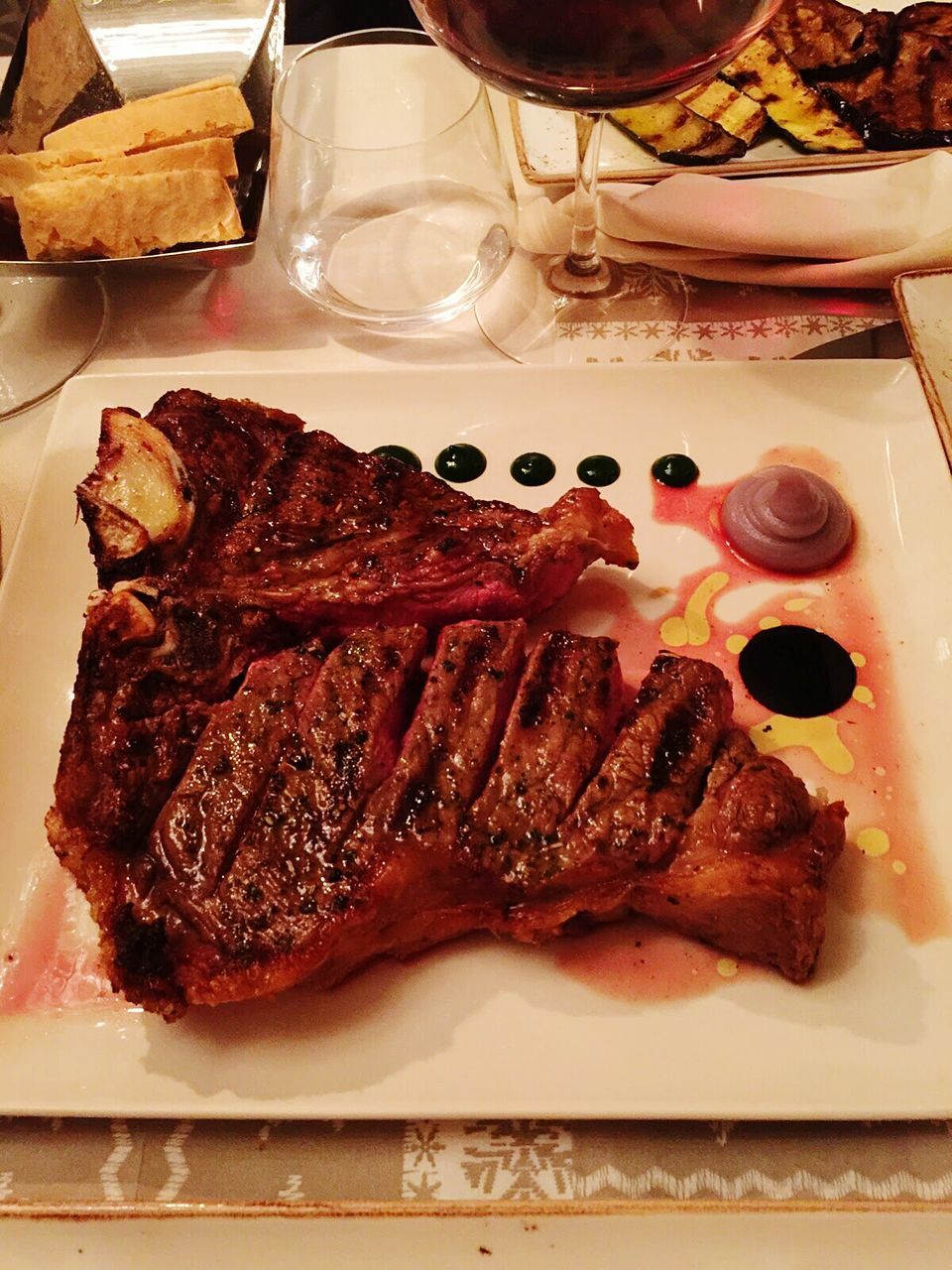 CLOSE-UP OF SERVED FOOD ON TABLE