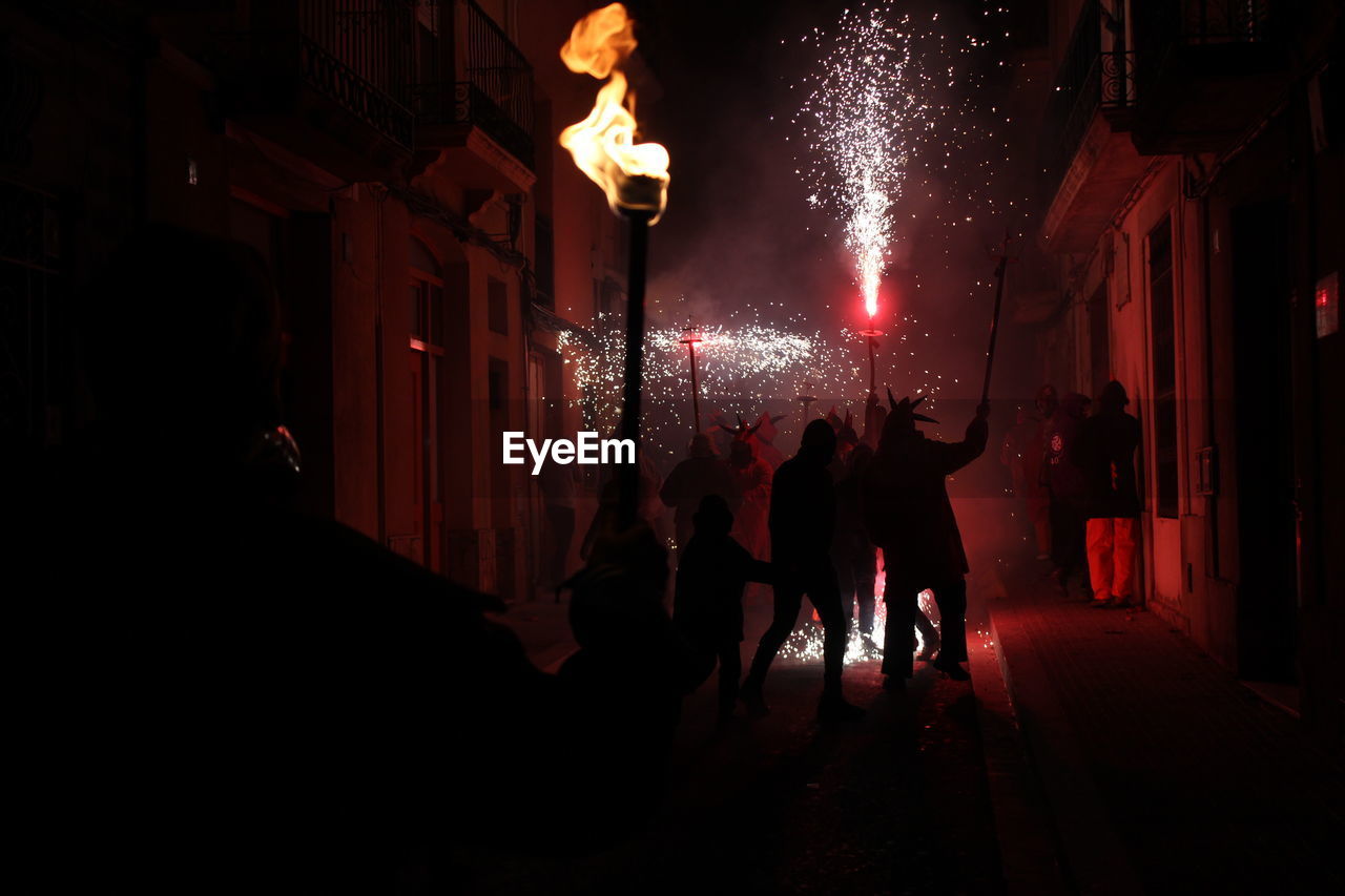 Correfoc parties, typical with firecrackers and lights in the towns