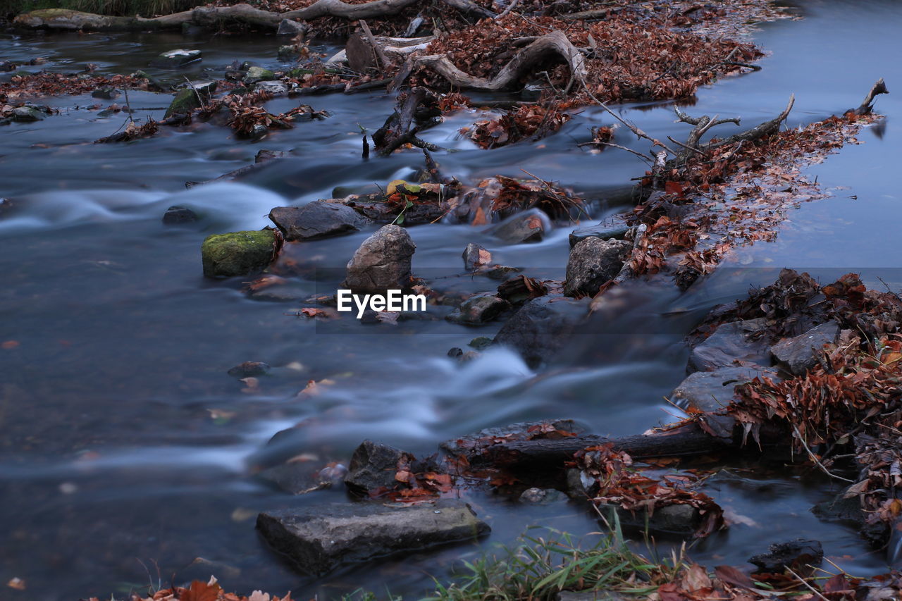 High angle view of rocks in lake