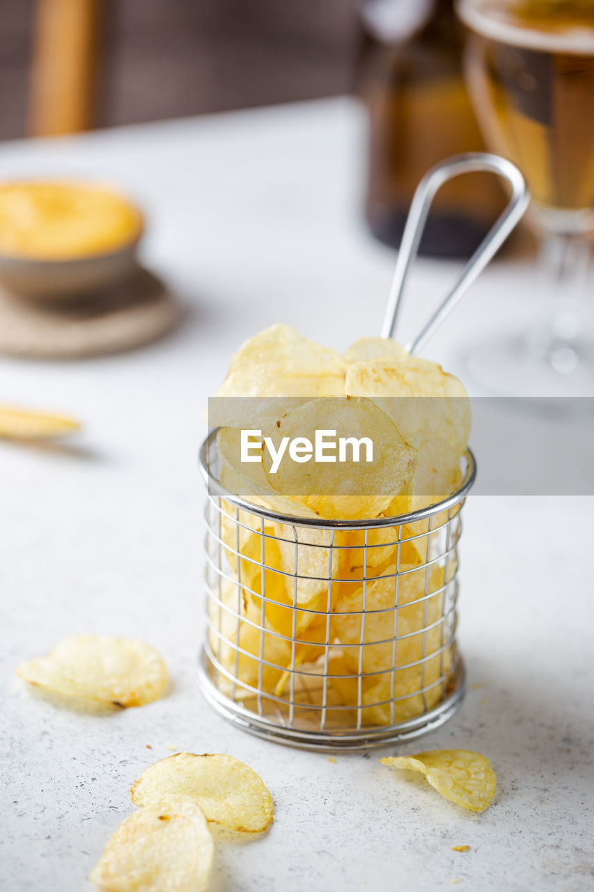 food and drink, food, dessert, breakfast, sweet food, dish, produce, freshness, kitchen utensil, healthy eating, citrus, yellow, meal, sweet, indoors, fruit, no people, lemon, dairy, focus on foreground, studio shot, eating utensil, baked, plant, spoon