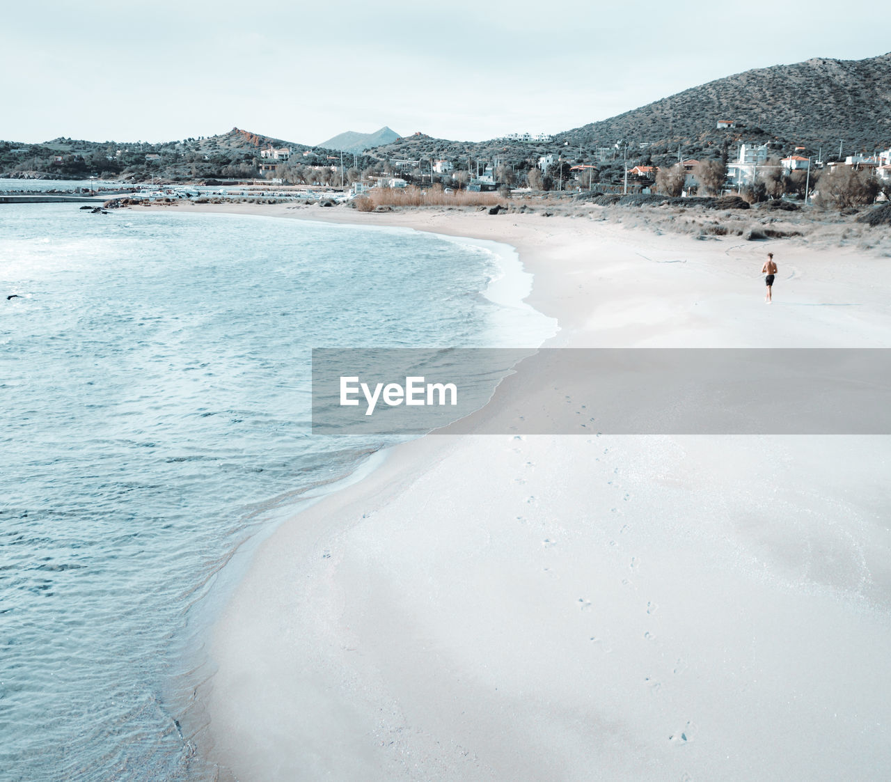 PANORAMIC SHOT OF BEACH AGAINST SKY