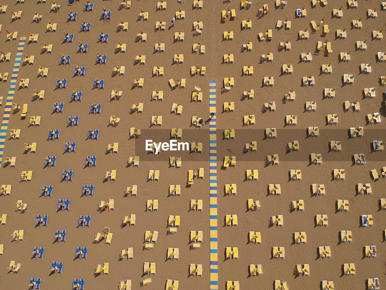 Full frame shot of lounge chairs on beach