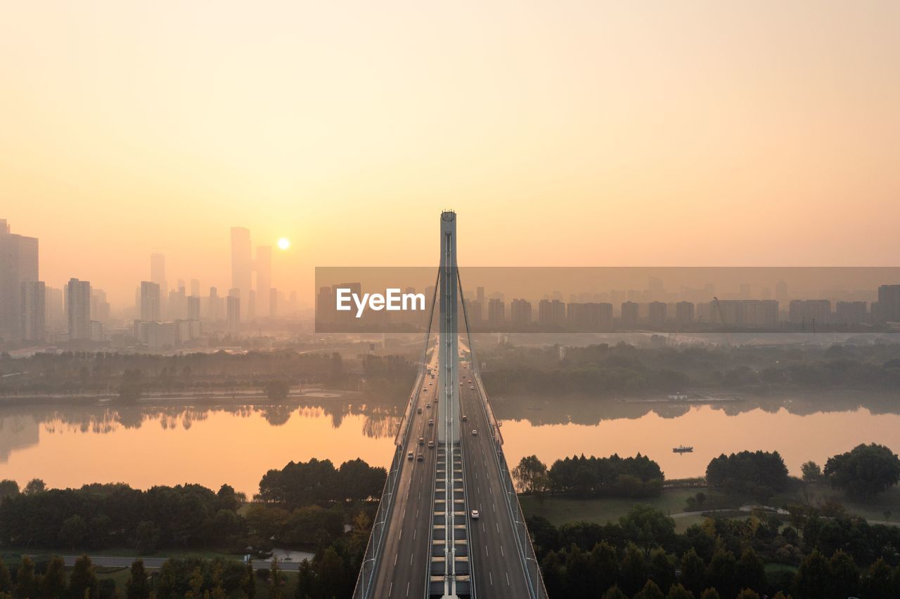 high angle view of city at sunset
