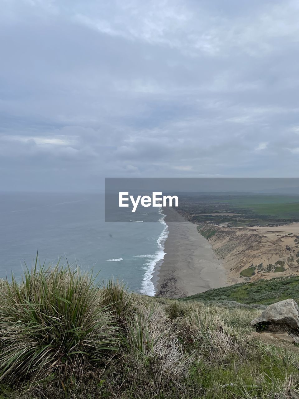 water, nature, beauty in nature, scenics - nature, plant, no people, sea, day, outdoors, environment, land, motion, tree, terrain, tranquility, cloud, beach, cliff, non-urban scene, sky, waterfall, tranquil scene, mountain