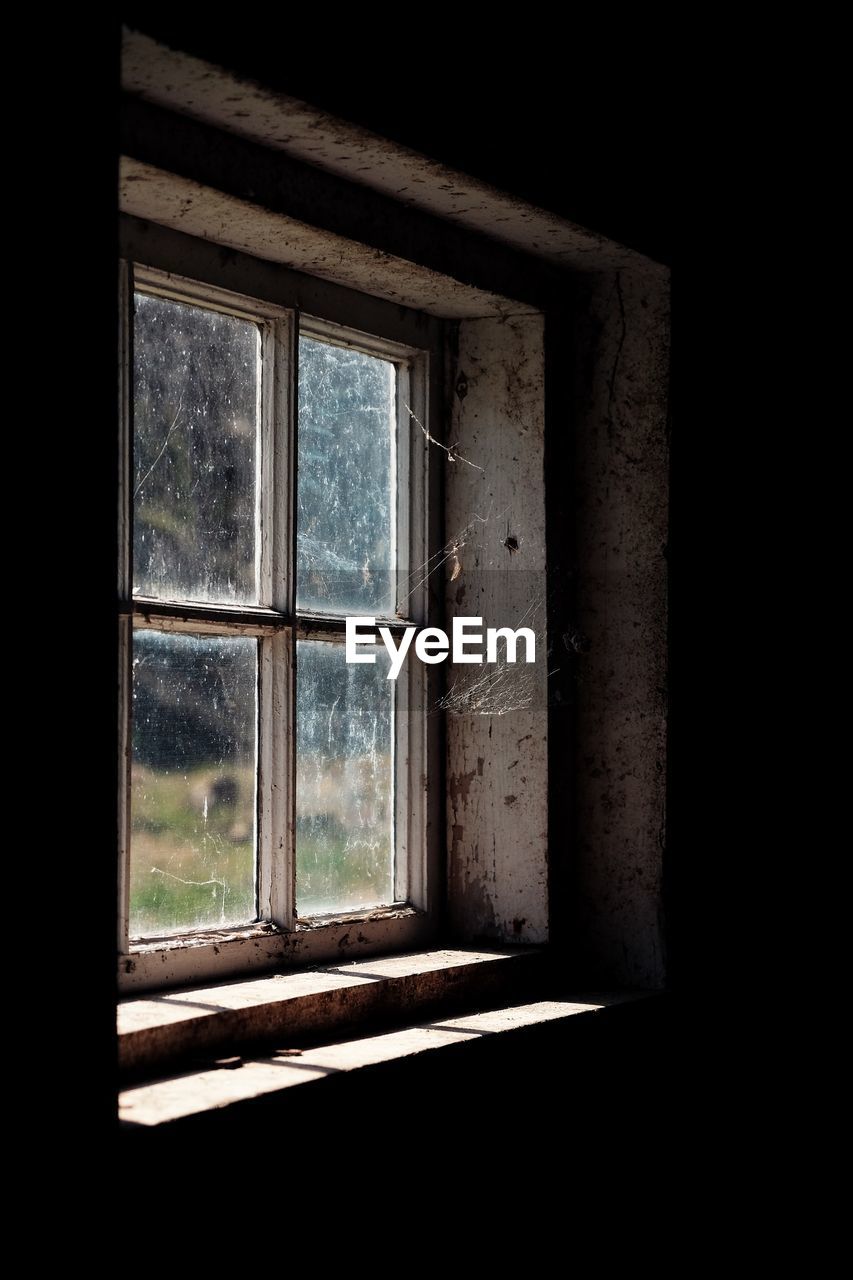 Window of abandoned house