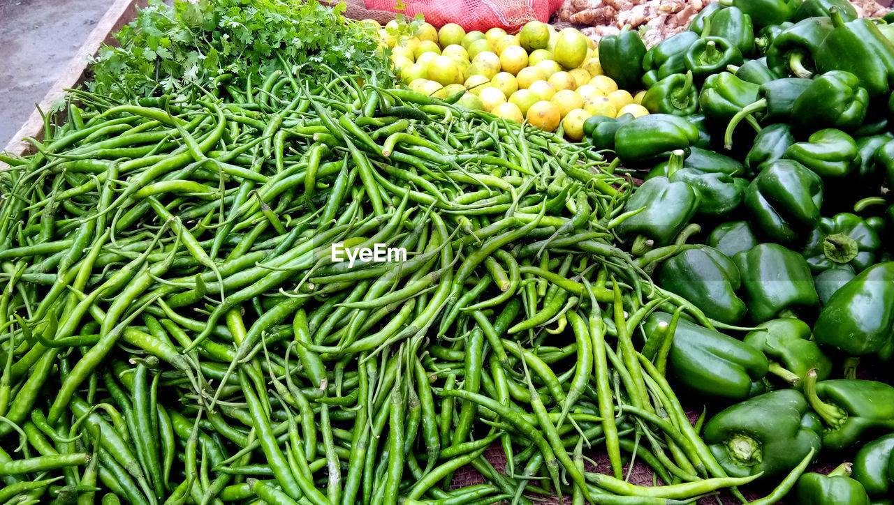 HIGH ANGLE VIEW OF VEGETABLES IN MARKET FOR SALE