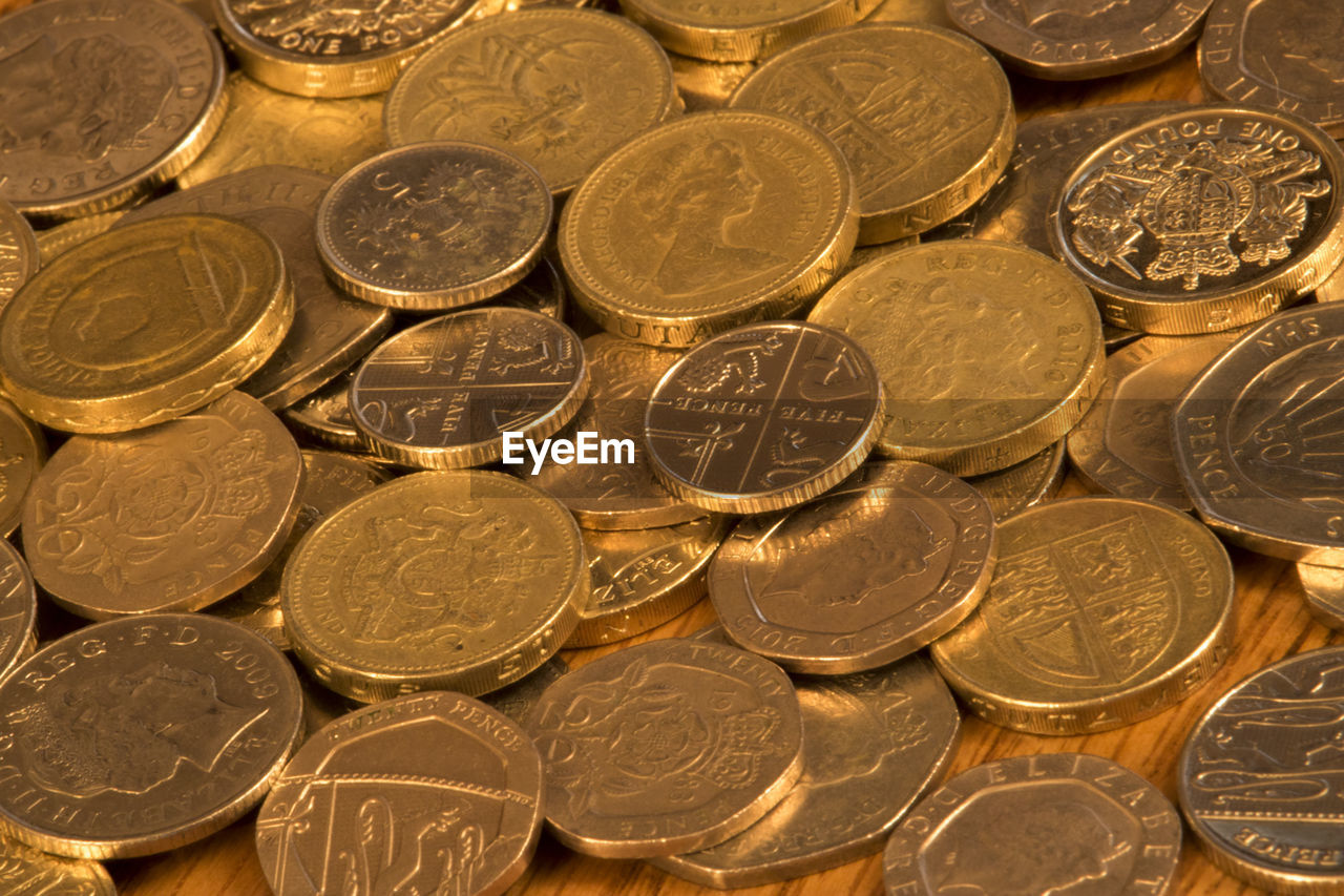 FULL FRAME SHOT OF COINS WITH PATTERN