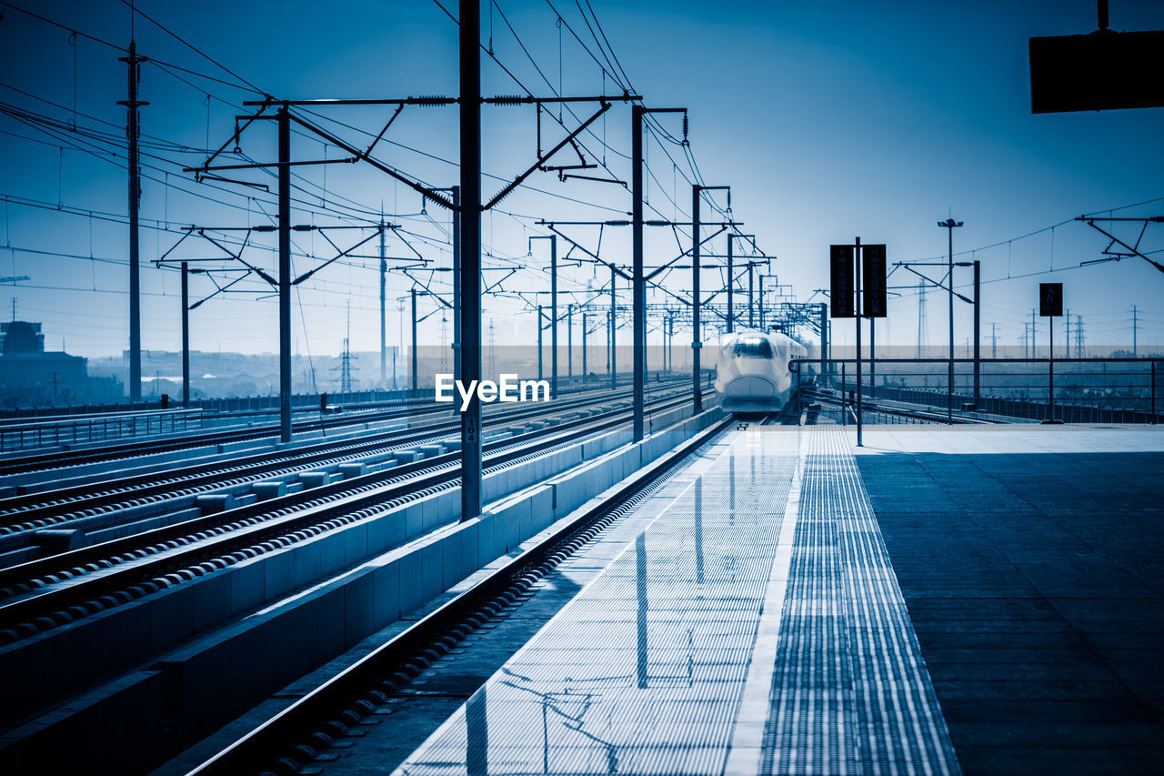 Railroad station platform against sky