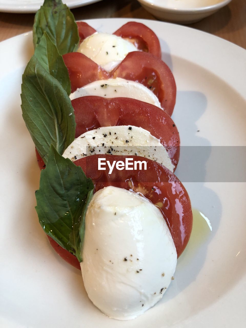 Close-up of caprese salad served in plate