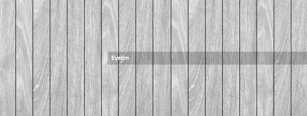 backgrounds, pattern, textured, full frame, wood, no people, floor, plank, close-up, laminate flooring, wood grain, wall - building feature, striped, rough, flooring, wood flooring, line, hardwood, built structure, day, wood paneling, old, weathered, in a row, material, abstract, repetition, architecture, wood stain, outdoors, black and white