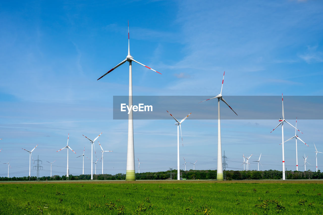 Modern wind turbines in a rural area in germany