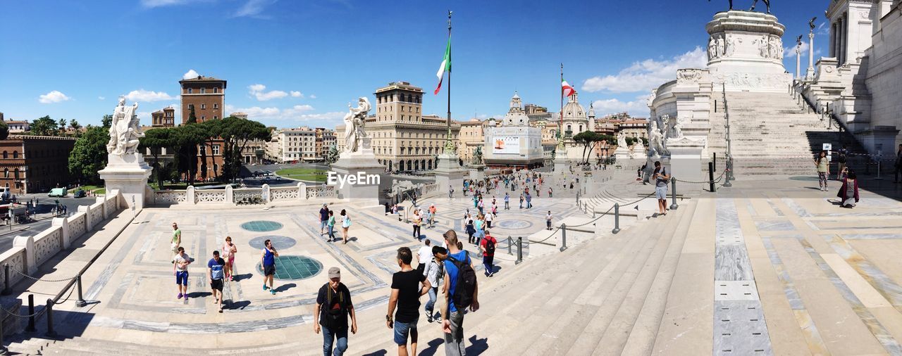 Panoramic view of tourists by altare della patria