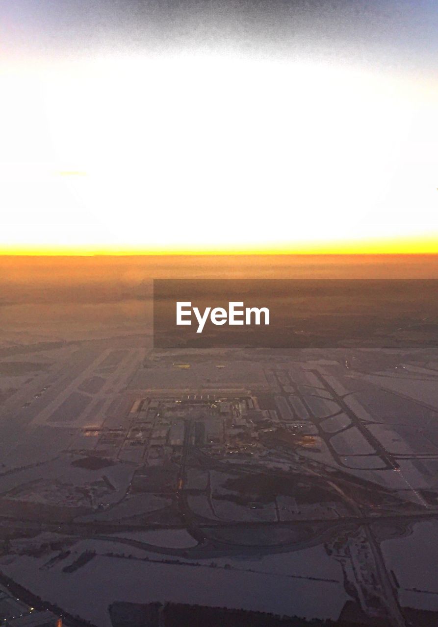 VIEW OF LANDSCAPE AT SUNSET