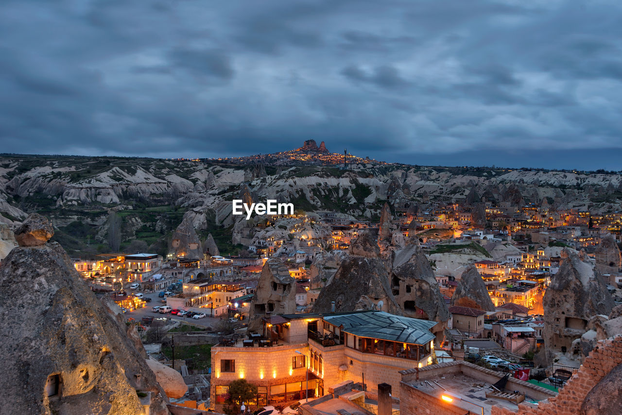 High angle view of illuminated buildings in town