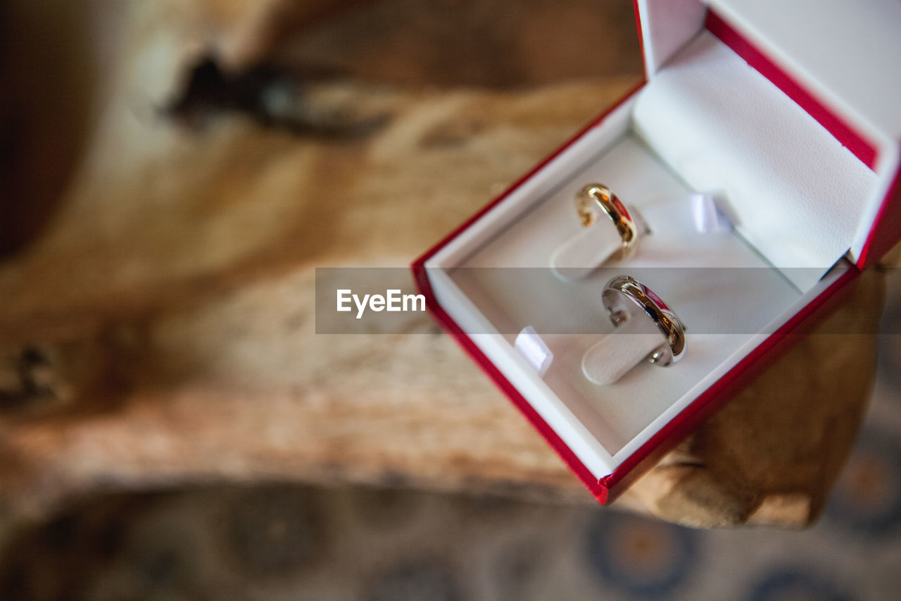 High angle view of engagement rings on table