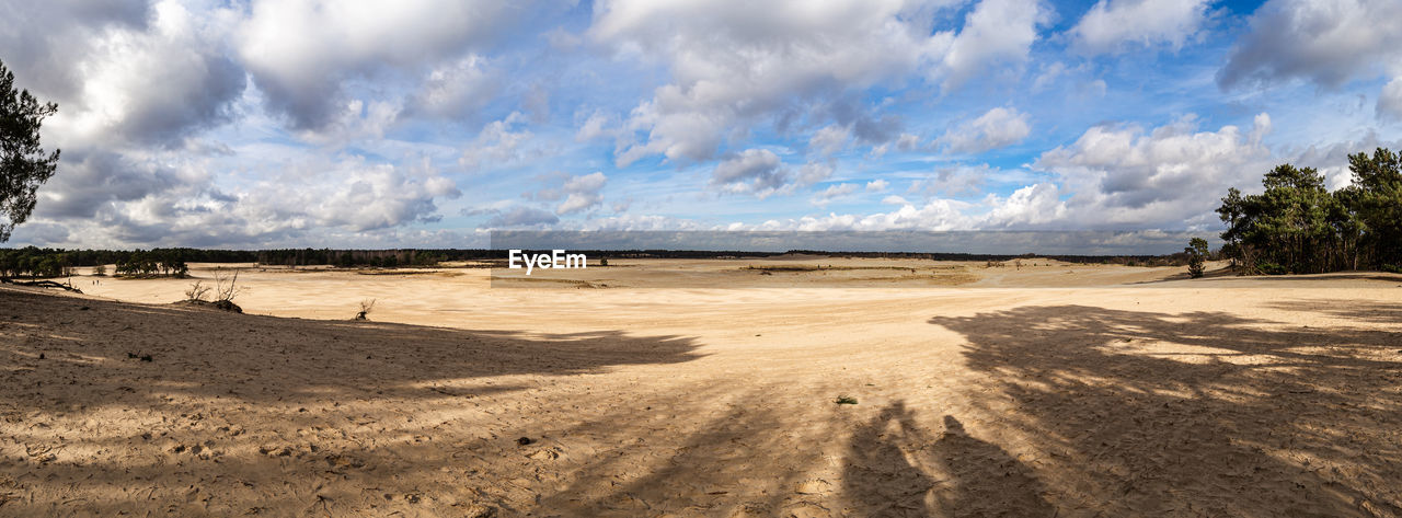 Panoramic view of desert against sky