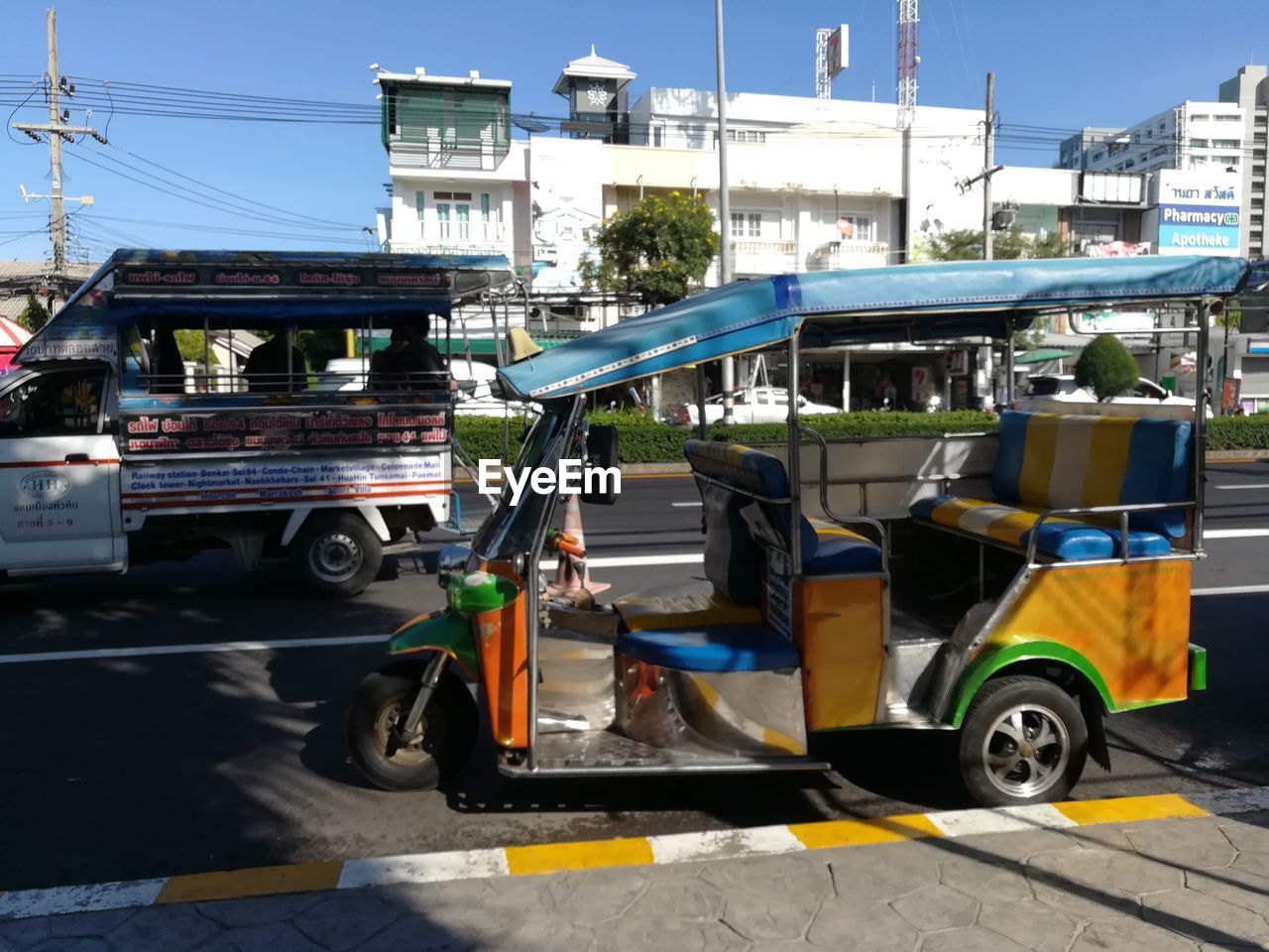 CARS ON STREET IN CITY