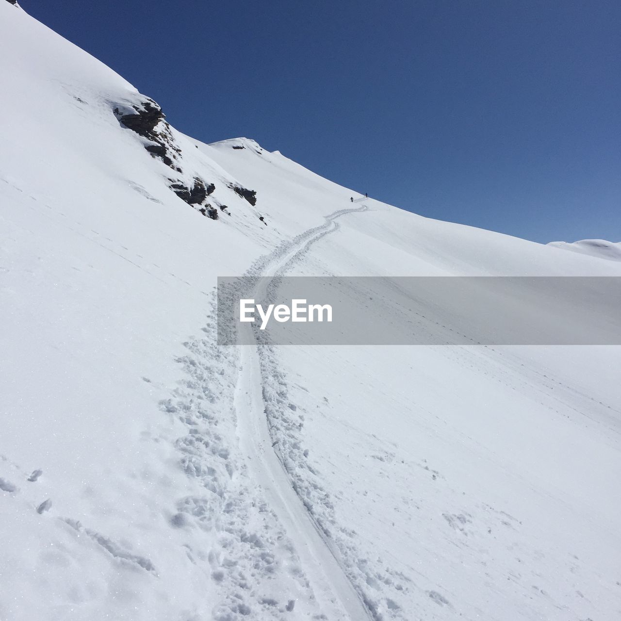 Snow covered mountain against sky