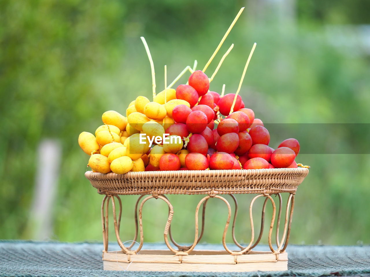 Close-up of fruits in wicker basket