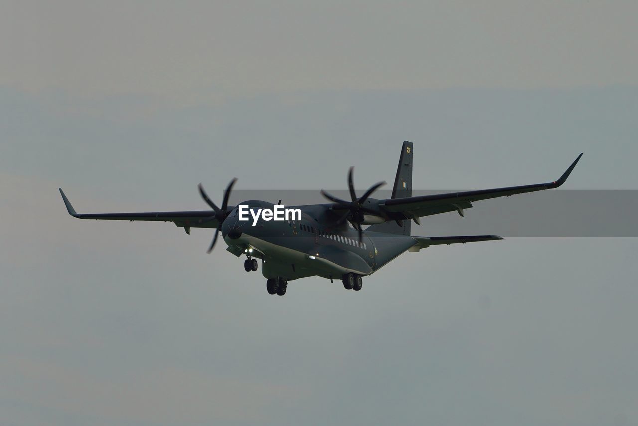 air vehicle, airplane, transportation, flying, mode of transportation, vehicle, sky, aircraft, aviation, aircraft engine, propeller-driven aircraft, air force, turboprop, on the move, military aircraft, no people, military, nature, mid-air, motion, travel, aerospace industry, outdoors, military transport aircraft, takeoff, propeller, single object
