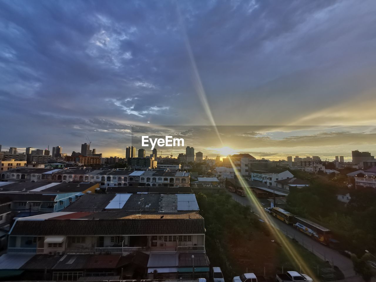 High angle view of buildings against sky during sunset