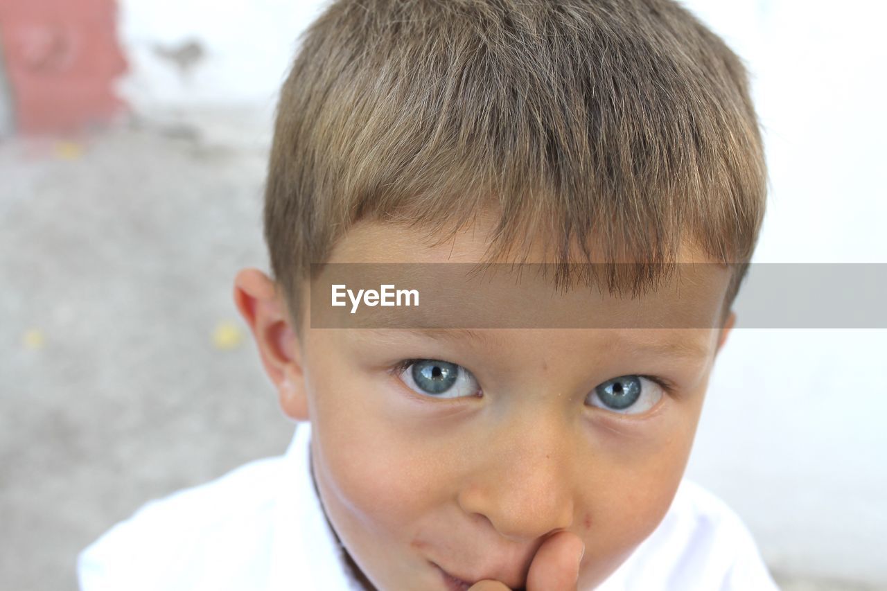 CLOSE-UP PORTRAIT OF CUTE BOY