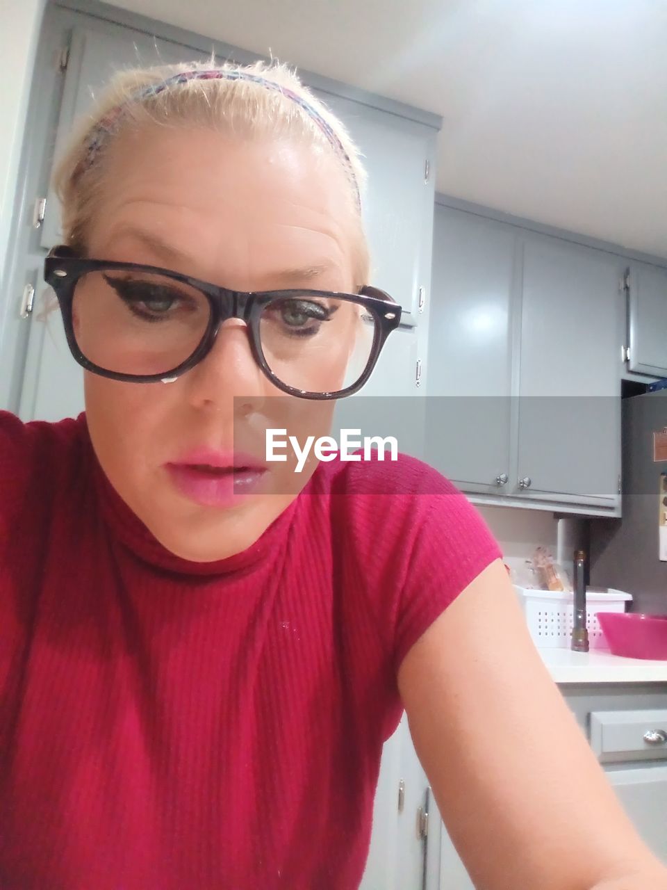 eyeglasses, glasses, vision care, one person, indoors, portrait, child, women, human face, person, adult, female, childhood, human hair, skin, looking, front view, lifestyles, waist up, headshot, eyewear, hairstyle, education, healthcare and medicine, looking at camera, nose, emotion, blond hair, pink, clothing