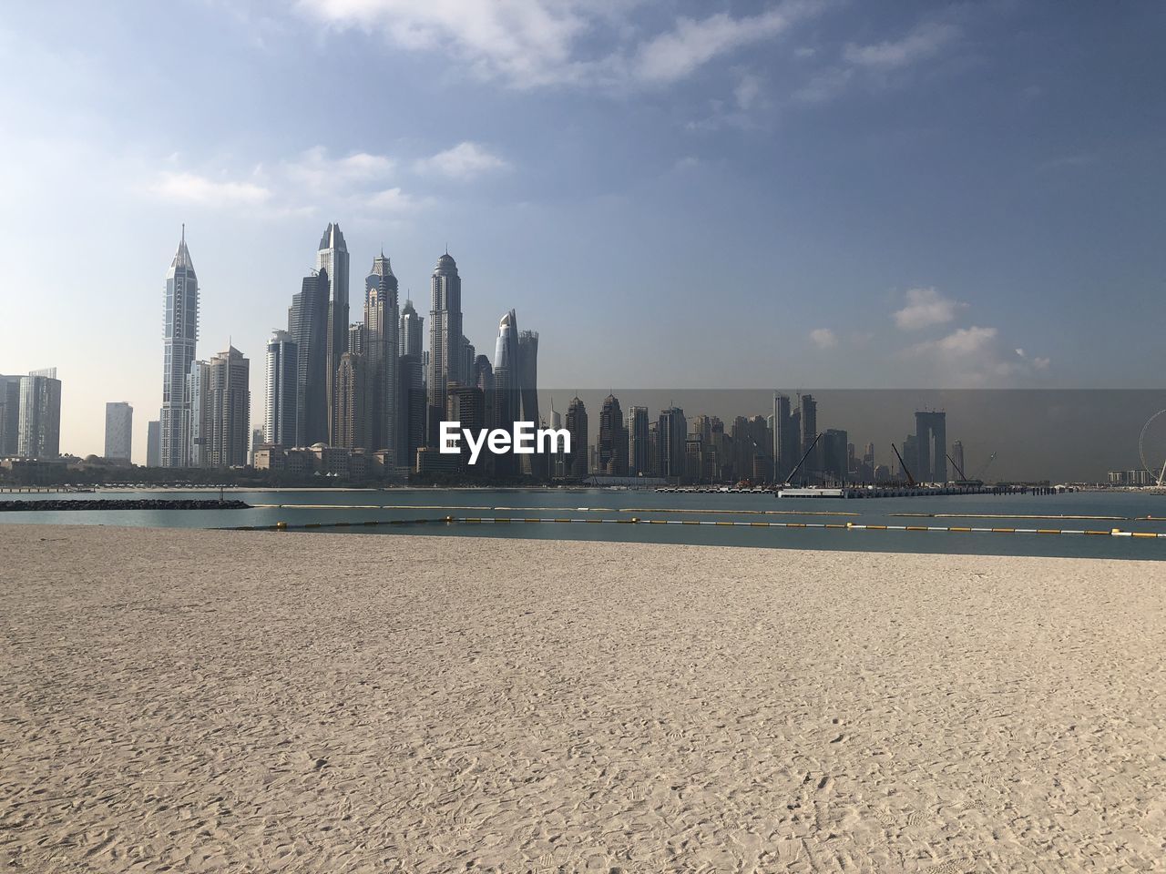 Modern buildings in city against sky