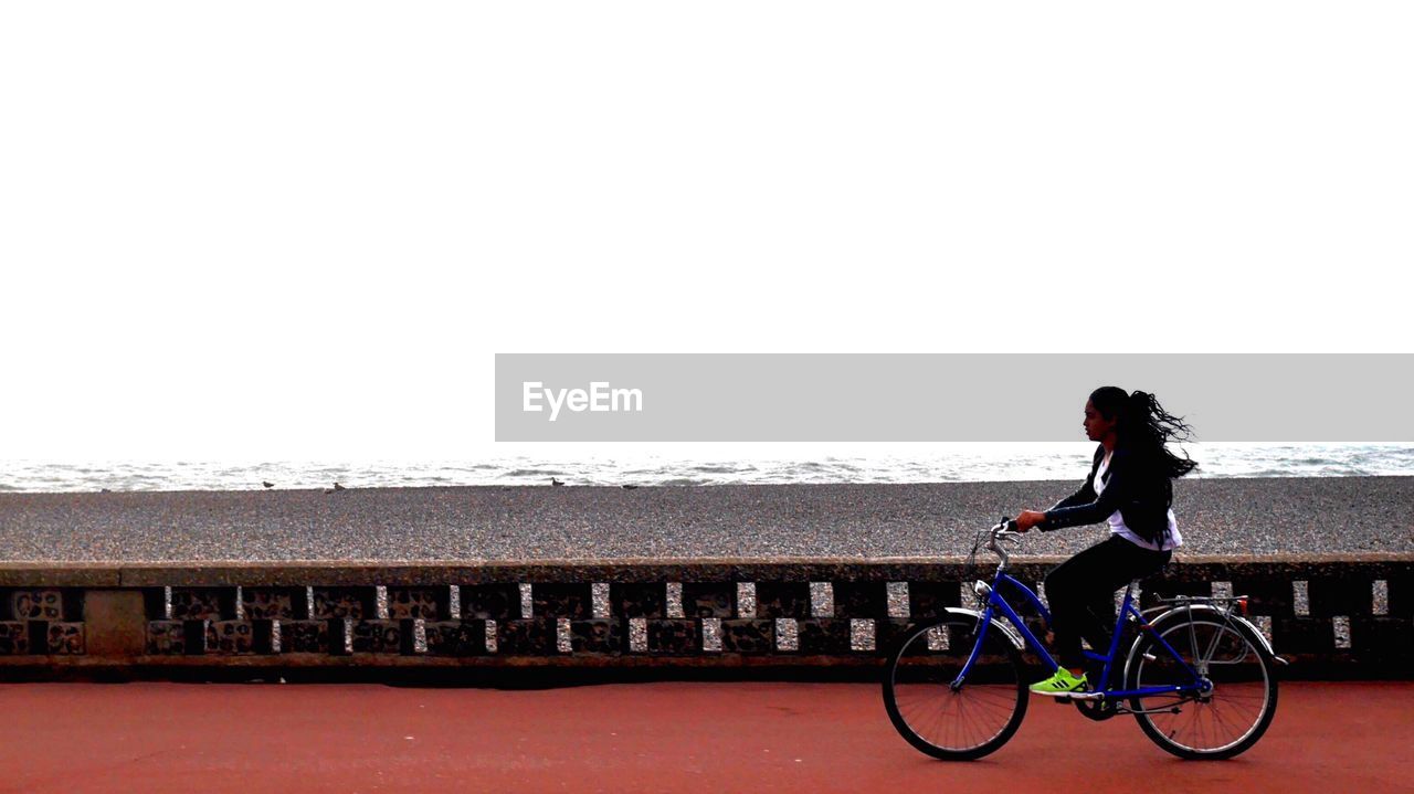 SILHOUETTE OF MAN IN TRAIN