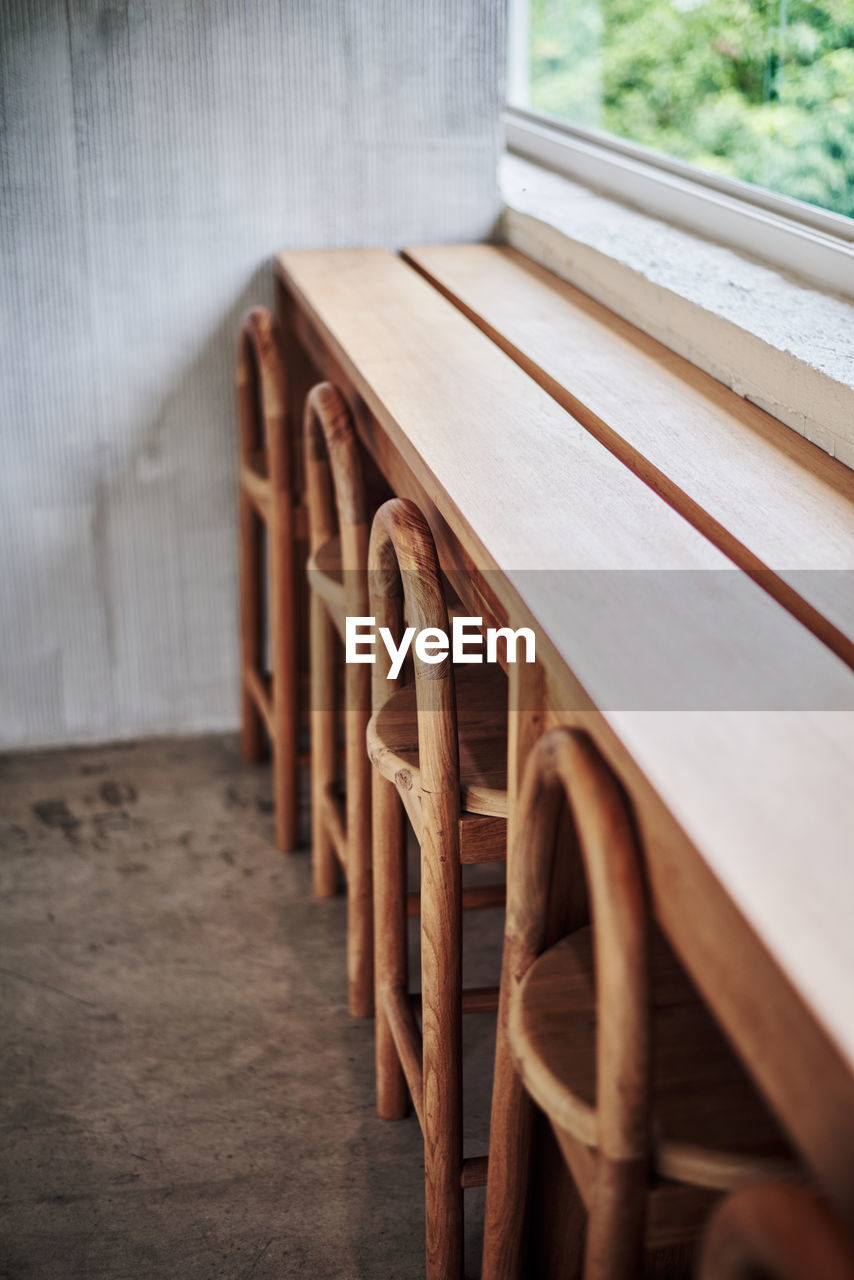 Close-up of wooden table and chairs