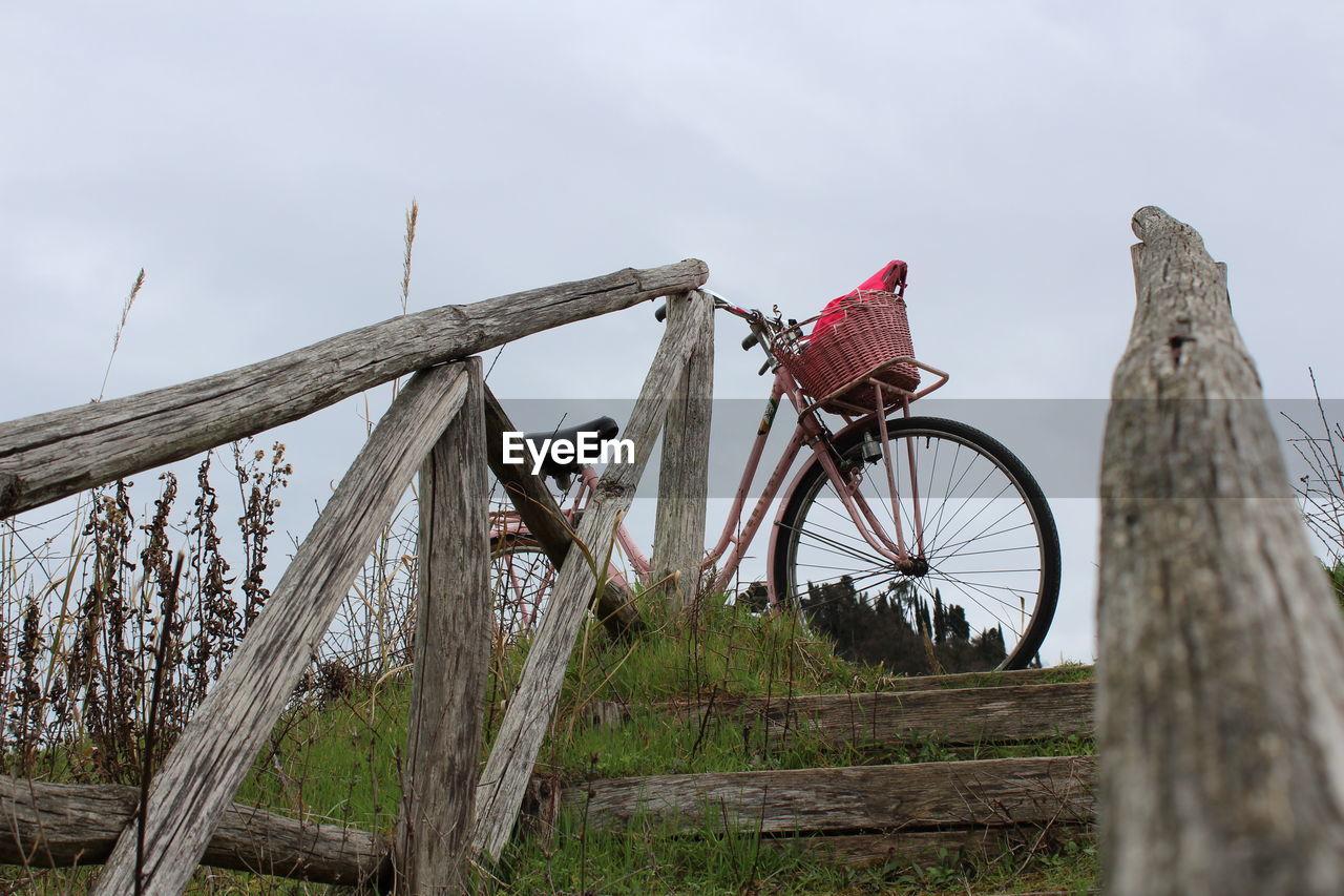 Low angle view of bicycle against sky