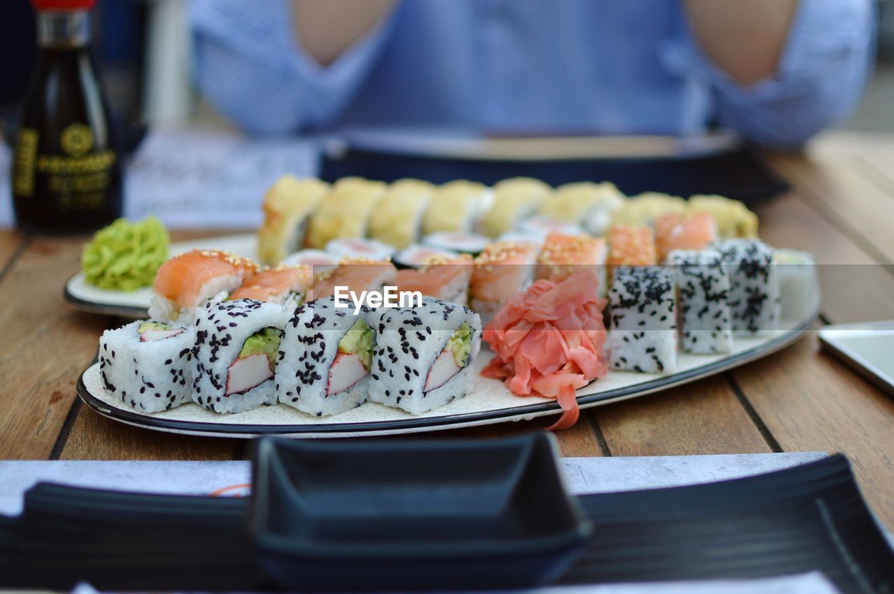 Close-up of sushi served on restaurant table