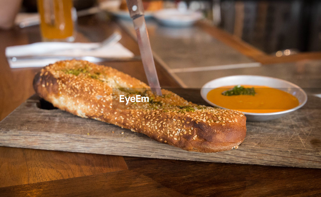 HIGH ANGLE VIEW OF MEAT ON TABLE