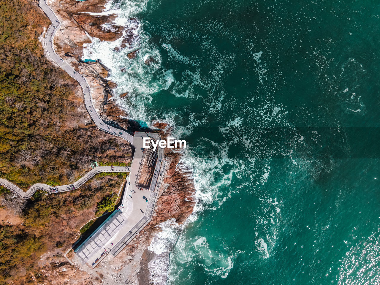 High angle view of road amidst sea