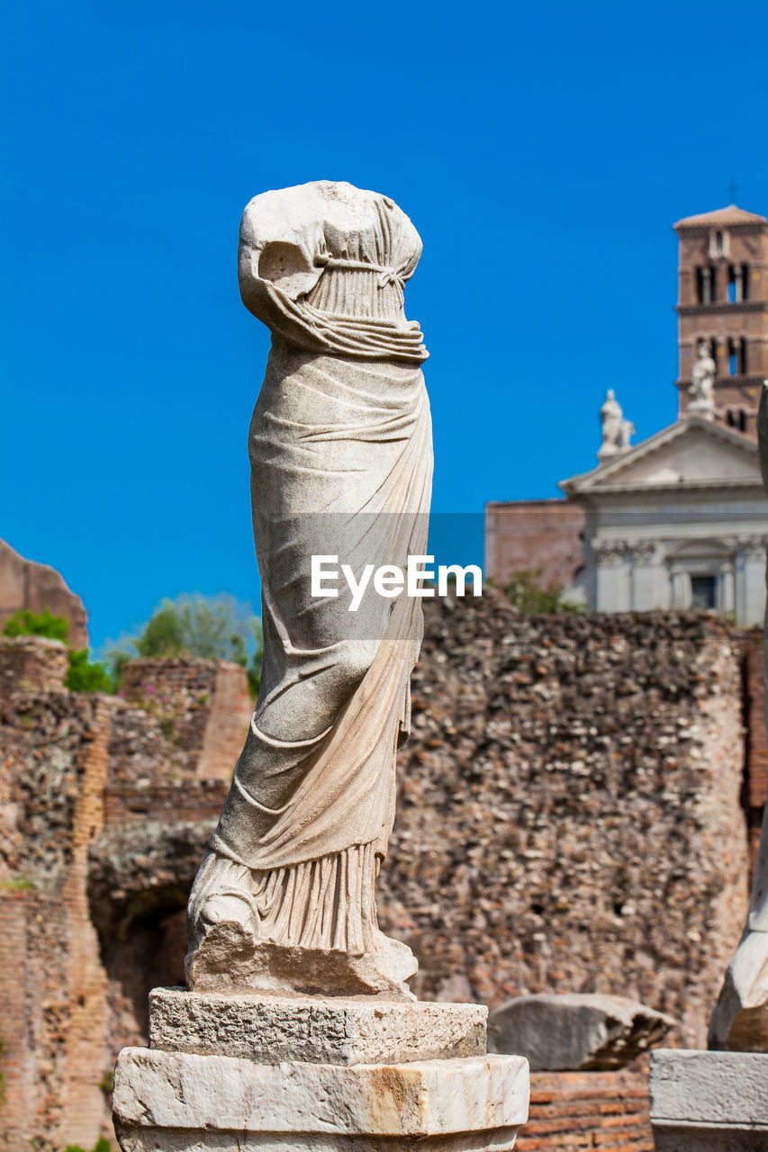 Ancient ruins of the house of the vestal virgins at the roman forum in rome