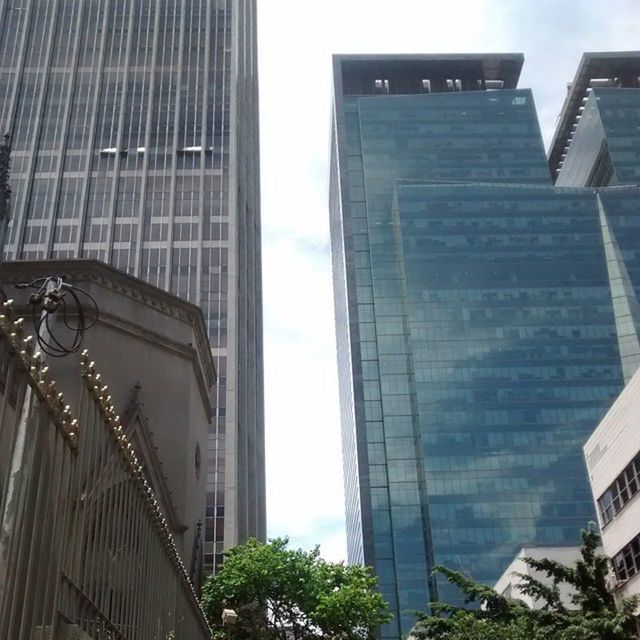 LOW ANGLE VIEW OF MODERN BUILDINGS